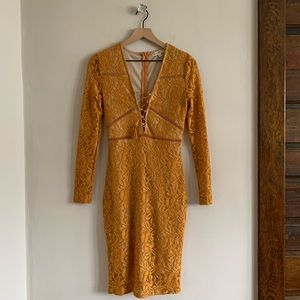 Yellow lace body con long sleeved dress